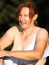 Removing clothes in a forested area of Bad Lauterbach