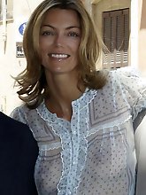 American mature cutie getting undressed on camera