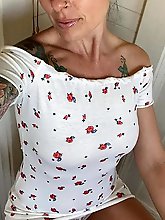 Older granny gets naked