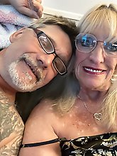 Half-naked explosive mature women posing.