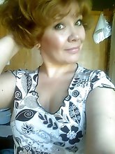 Fiery older mama playing alone