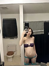 Older strumpet is fingering herself